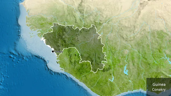 几内亚边境地区的特写镜头 用卫星地图上的黑暗阴影突出显示出来 资本点 概略地描述一下国家的面貌 国家及其首都的英文名称 — 图库照片
