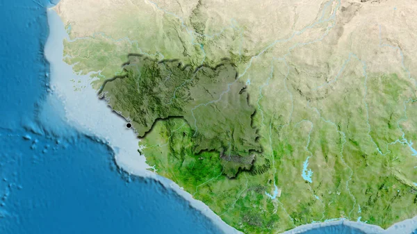 衛星地図上の暗いオーバーレイで強調ギニア国境地域のクローズアップ 資本ポイント 国の形の縁が隠されている — ストック写真