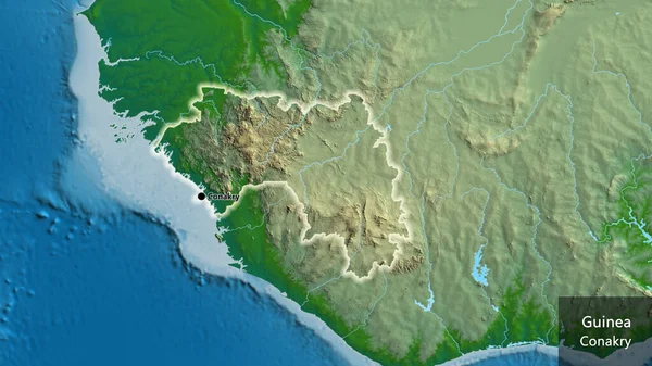 物理的な地図上のギニア国境地域の閉鎖 資本ポイント 国の形の周りに光る 英名国とその首都 — ストック写真