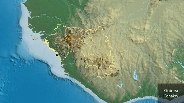 在一张救济地图上对几内亚边境地区及其区域边界进行了密切监视 资本点 概略地描述一下国家的面貌 国家及其首都的英文名称 — 图库照片