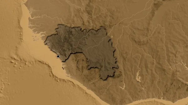 几内亚边境地区的特写镜头突出显示了黑色的覆盖在黑色的高程地图上 资本点 国家形状的斜边 — 图库照片