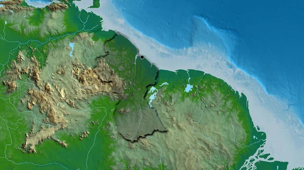 ガイアナ国境地域のクローズアップは 物理的な地図上の暗いオーバーレイで強調しています 資本ポイント 国の形の縁が隠されている — ストック写真