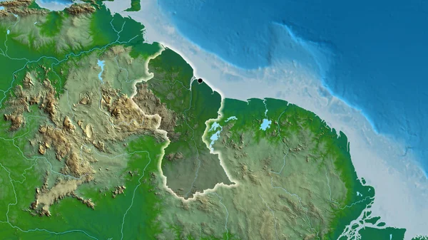 Guyana sınır bölgesinin yakın çekimleri fiziksel haritada koyu bir örtüyle vurgulanıyor. Ana nokta. Ülke çapında parıltı. 