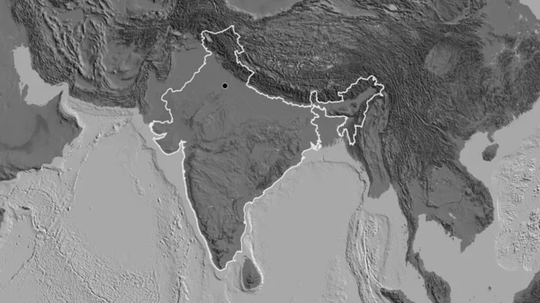 Close-up of the India border area on a bilevel map. Capital point. Outline around the country shape.