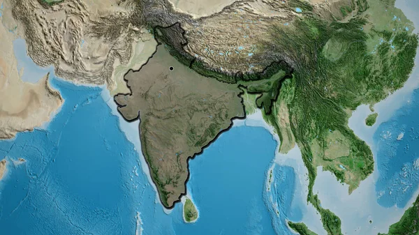 Close-up of the India border area highlighting with a dark overlay on a satellite map. Capital point. Bevelled edges of the country shape.