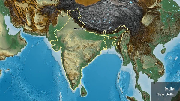 Close-up of the India border area on a relief map. Capital point. Outline around the country shape. English name of the country and its capital