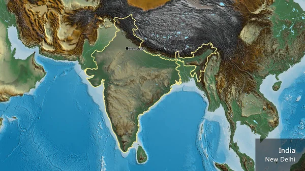 Close-up of the India border area highlighting with a dark overlay on a relief map. Capital point. Outline around the country shape. English name of the country and its capital