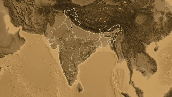 Close-up of the India border area and its regional borders on a sepia elevation map. Capital point. Outline around the country shape.