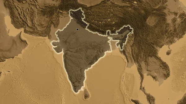 Close-up of the India border area highlighting with a dark overlay on a sepia elevation map. Capital point. Glow around the country shape.