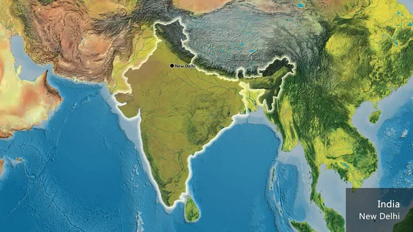 Close-up of the India border area highlighting with a dark overlay on a topographic map. Capital point. Glow around the country shape. English name of the country and its capital