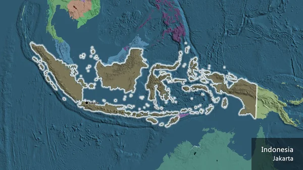 行政地図上の暗いオーバーレイで強調インドネシア国境地域のクローズアップ 資本ポイント 国の形の周りに光る 英名国とその首都 — ストック写真