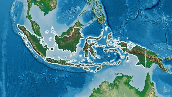 物理的な地図上の暗いオーバーレイで強調されているインドネシア国境地域のクローズアップ 資本ポイント 全国に光る — ストック写真