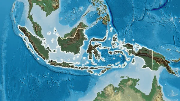 救援地図上の暗いオーバーレイで強調されているインドネシア国境地域のクローズアップ 資本ポイント 全国に光る — ストック写真