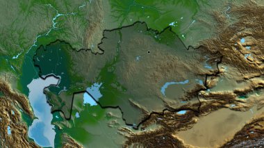 Kazakistan sınır bölgesinin yakın çekimleri fiziksel bir harita üzerinde koyu bir örtüyle vurgulanıyor. Ana nokta. Ülkenin kıvrımlı kenarları. 
