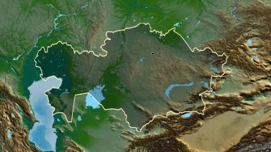 Kazakistan sınır bölgesinin yakın çekimleri fiziksel bir harita üzerinde koyu bir örtüyle vurgulanıyor. Ana nokta. Ülke şekli etrafında özet geç. 
