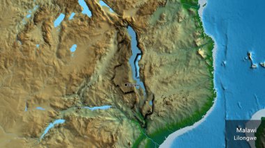 Malawi sınır bölgesinin yakın çekimleri fiziksel haritada koyu bir örtüyle vurgulanıyor. Ana nokta. Kırsal kesimin kıvrımlı kenarları. Ülkenin ve başkentinin İngilizce adı