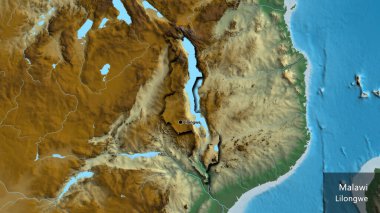 Malawi sınır bölgesinin yakınındaki bir haritada. Ana nokta. Kırsal kesimin kıvrımlı kenarları. Ülkenin ve başkentinin İngilizce adı