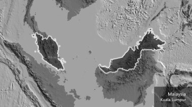 Malezya sınır bölgesinin yakın çekimi, bilek haritasında koyu bir örtüyle vurgulanıyor. Ana nokta. Ülke çapında parıldıyor. Ülkenin ve başkentinin İngilizce adı