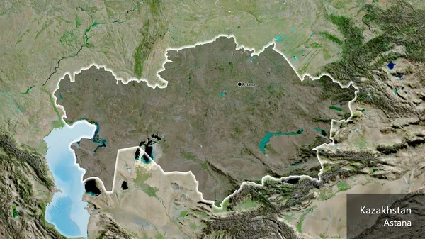 衛星地図上の暗いオーバーレイで強調カザフスタン国境地域のクローズアップ 資本ポイント 国の形の周りに光る 英名国とその首都 — ストック写真