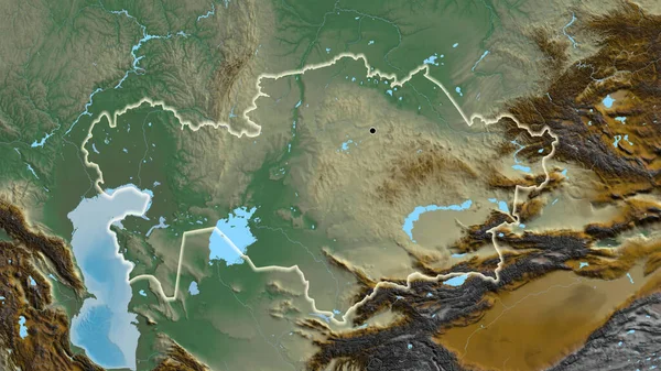 在一张救济地图上对哈萨克斯坦边境地区进行的密切监视 资本点 风靡全国 — 图库照片