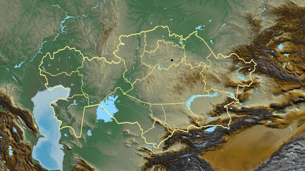 在一张救济地图上对哈萨克斯坦边境地区及其区域边界进行了密切监视 资本点 国家形貌概述 — 图库照片