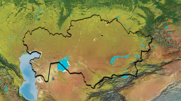 在一张地形图上对哈萨克斯坦边境地区进行密切监视 资本点 国家形状的斜边 — 图库照片