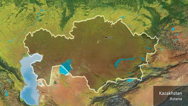 地形図上の暗いオーバーレイで強調カザフスタン国境地域のクローズアップ 資本ポイント 国の形の周りに光る 英名国とその首都 — ストック写真