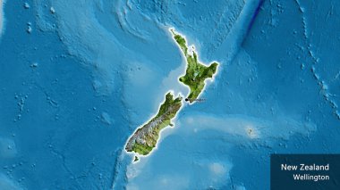 Yeni Zelanda sınır bölgesinin uydu haritası üzerinde yakın plan görüntüsü. Ana nokta. Ülke çapında parıldıyor. Ülkenin ve başkentinin İngilizce adı