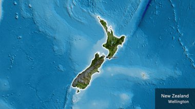 Yeni Zelanda sınır bölgesinin, uydu haritasında koyu bir örtüyle ışıklandırılması. Ana nokta. Ülke çapında parıldıyor. Ülkenin ve başkentinin İngilizce adı