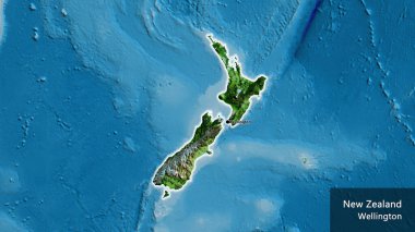 Yeni Zelanda sınır bölgesinin uydu haritası üzerinde yakın plan görüntüsü. Ana nokta. Ülke çapında parıldıyor. Ülkenin ve başkentinin İngilizce adı