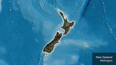 Yeni Zelanda sınır bölgesinin yakın çekimleri bir yardım haritasında koyu bir örtüyle vurgulanıyor. Ana nokta. Ülke çapında parıldıyor. Ülkenin ve başkentinin İngilizce adı