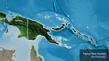 Papua Yeni Gine sınır bölgesinin uydu haritasında koyu bir örtüyle işaretlenmiş yakın çekimi. Ana nokta. Ülke çapında parıldıyor. Ülkenin ve başkentinin İngilizce adı