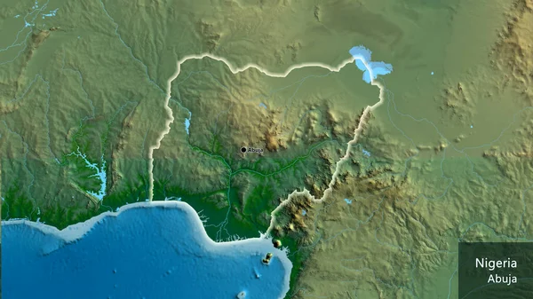 物理的な地図上のニジェール国境地域のクローズアップ 資本ポイント 国の形の周りに光る 英名国とその首都 — ストック写真