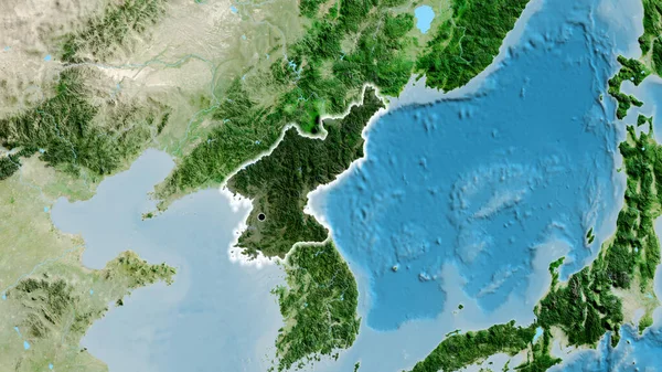 Close-up of the North Korea border area highlighting with a dark overlay on a satellite map. Capital point. Glow around the country shape.