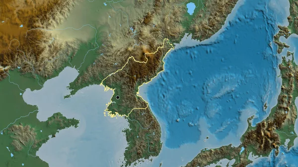 stock image Close-up of the North Korea border area on a relief map. Capital point. Outline around the country shape. 