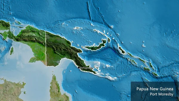 衛星地図上の暗いオーバーレイで強調されているパプアニューギニア国境地域のクローズアップ 資本ポイント 国の形の周りの概要 英名国とその首都 — ストック写真