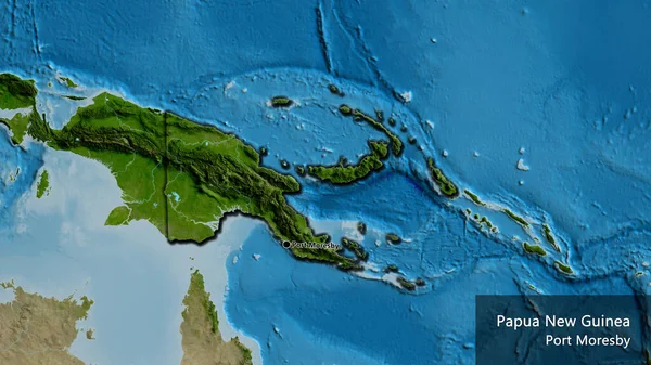 在卫星地图上对巴布亚新几内亚边境地区进行了近距离调查 资本点 这个国家的边缘呈斜角状 国家及其首都的英文名称 — 图库照片