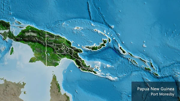 在卫星地图上对巴布亚新几内亚边境地区及其区域边界进行密切监视 资本点 概略地描述一下国家的面貌 国家及其首都的英文名称 — 图库照片