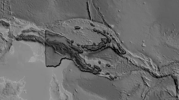 パプアニューギニア国境地域のクローズアップは グレースケールの地図上の暗いオーバーレイで強調しています 資本ポイント 国の形の縁が隠されている — ストック写真