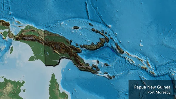 对巴布亚新几内亚边境地区的近距离调查突出显示了一张救济地图上的黑暗阴影 资本点 这个国家的边缘呈斜角状 国家及其首都的英文名称 — 图库照片
