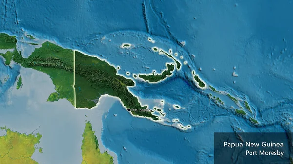 パプアニューギニア国境地域のクローズアップは 地形図上の暗いオーバーレイで強調されています 資本ポイント 国の形の周りに光る 英名国とその首都 — ストック写真