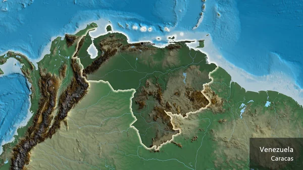 救援地図上の暗いオーバーレイで強調ベネズエラ国境地域のクローズアップ 資本ポイント 国の形の周りに光る 英名国とその首都 — ストック写真