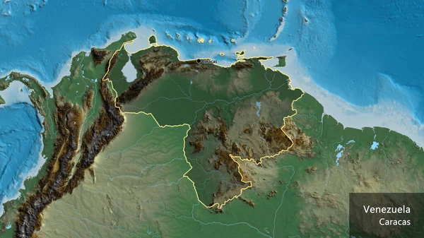 救援地図上の暗いオーバーレイで強調ベネズエラ国境地域のクローズアップ 資本ポイント 国の形の周りの概要 英名国とその首都 — ストック写真