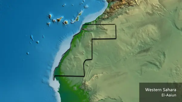 Close-up of the Western Sahara border area on a physical map. Capital point. Bevelled edges of the country shape. English name of the country and its capital