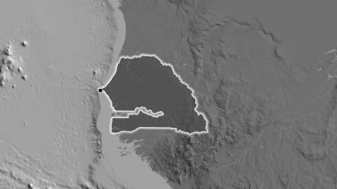 Senegal sınır bölgesinin yakın planında bilek haritasının üzerinde koyu bir kaplama var. Ana nokta. Ülke çapında parıltı. 