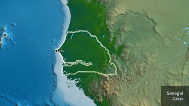 Senegal sınır bölgesinin fiziksel bir haritada yakın plan görüntüsü. Ana nokta. Ülke çapında parıldıyor. Ülkenin ve başkentinin İngilizce adı