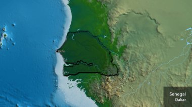 Senegal sınır bölgesinin yakın çekimleri fiziksel haritada koyu bir örtüyle vurgulanıyor. Ana nokta. Kırsal kesimin kıvrımlı kenarları. Ülkenin ve başkentinin İngilizce adı