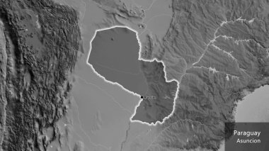Paraguay sınır bölgesinin, gri tonlamalı bir haritada koyu bir örtüyle ışıklandırılması. Ana nokta. Ülke çapında parıldıyor. Ülkenin ve başkentinin İngilizce adı