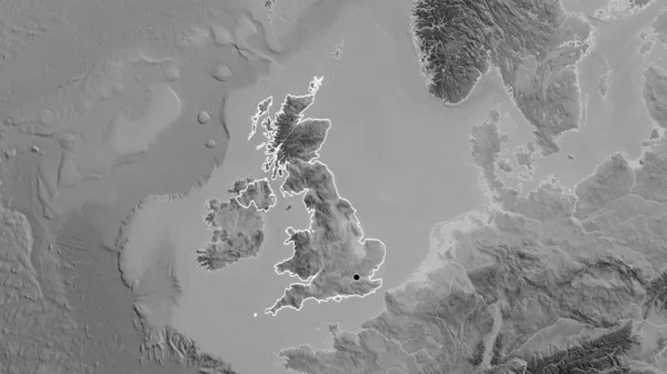 在一张灰色比例尺地图上对联合王国边境地区进行的密切监视 资本点 国家形貌概述 — 图库照片
