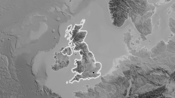 在一张灰色比例尺地图上对联合王国边境地区进行的密切监视 资本点 风靡全国 — 图库照片